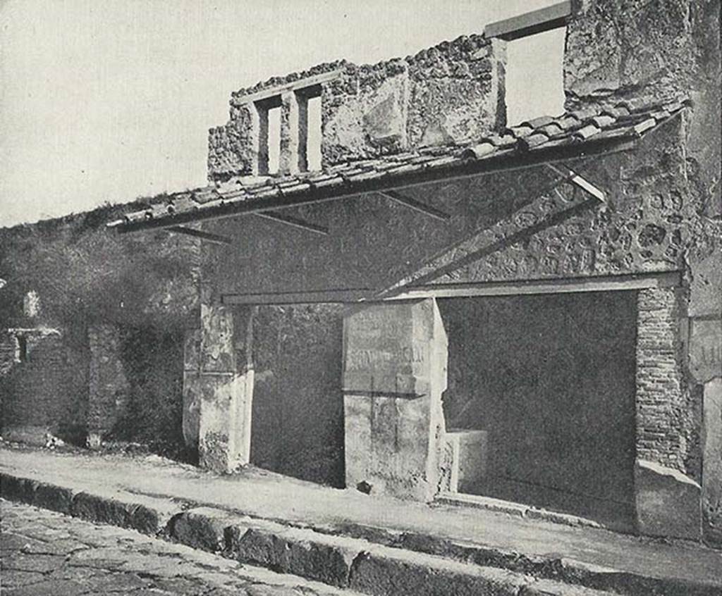 I.11.2 Pompeii, on right. c.1920. Entrance doorways, with I.11.3, on left. 
Upper storey windows are visible.

