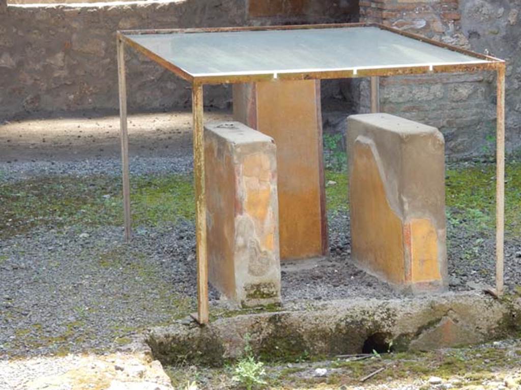 I.11.6 Pompeii. May 2015. Table supports and pedestal on which the statue of the Venus in the Bikini was probably found.
Photo courtesy of Buzz Ferebee.
