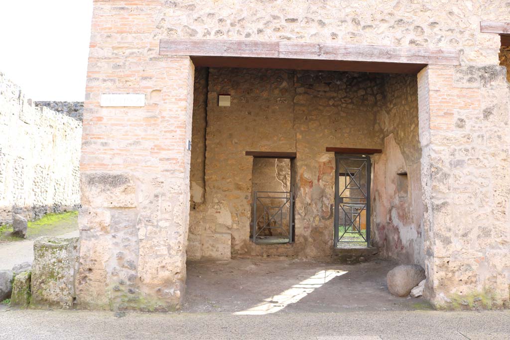I.11.7 Pompeii. December 2018. Looking towards south wall with doorway to rear room. Photo courtesy of Aude Durand.