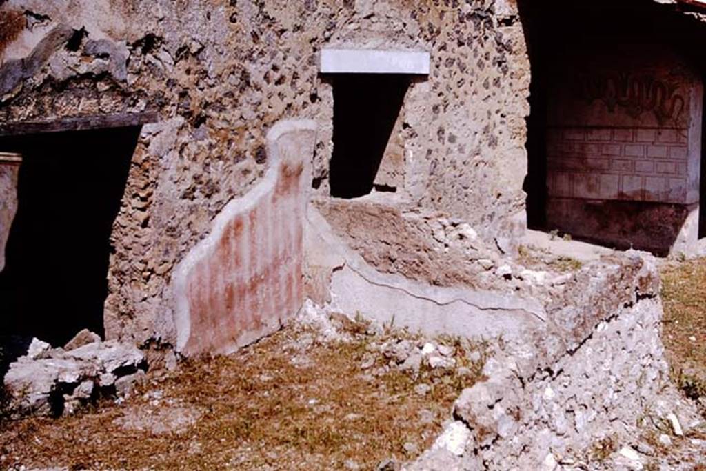 I.11.10 Pompeii. 1964. Looking north-west from garden area, across a small enclosure with a low wall. According to Wilhelmina, the inside of the low wall was painted to represent a fence with plants growing behind it. Photo by Stanley A. Jashemski.
Source: The Wilhelmina and Stanley A. Jashemski archive in the University of Maryland Library, Special Collections (See collection page) and made available under the Creative Commons Attribution-Non Commercial License v.4. See Licence and use details.
J64f1677
