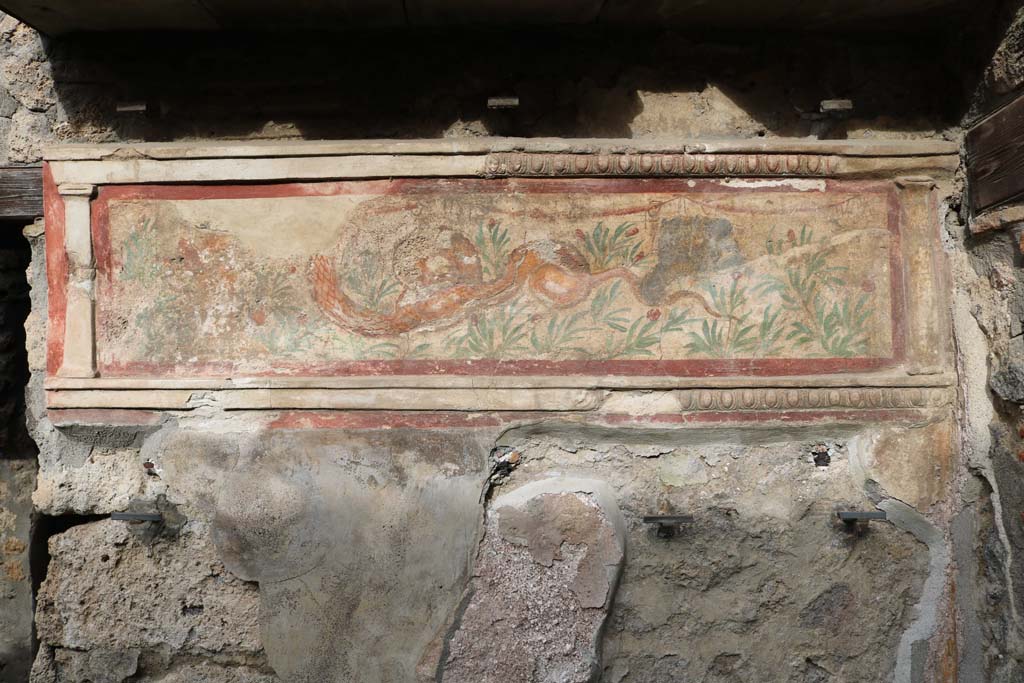 I.11.11 Pompeii. December 2018. Lararium on north wall of bar-room. Photo courtesy of Aude Durand.

