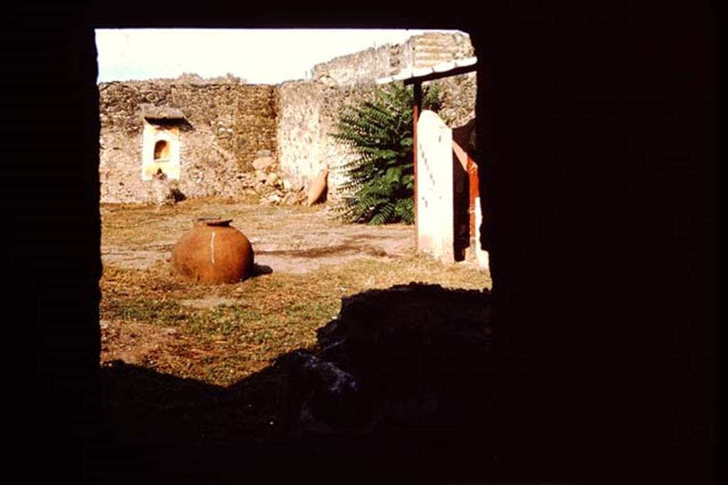 I.11.11 Pompeii. 1964. Looking east from window in room on north side of thermopolium. Photo by Stanley A. Jashemski.
Source: The Wilhelmina and Stanley A. Jashemski archive in the University of Maryland Library, Special Collections (See collection page) and made available under the Creative Commons Attribution-Non Commercial License v.4. See Licence and use details.
J64f1967
