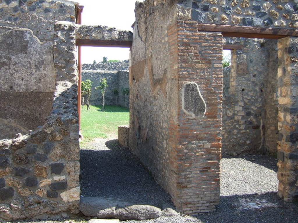 I.11.12 Pompeii. September 2005.  Corridor to garden, and doorway to room.