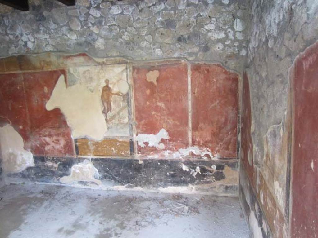 I.11.15 Pompeii.  December 2007.  Room 13. Remains of the painting of Ariadne abandoned by Theseus.  The figure of Ariadne was removed during the 1977 burglary.  See Bragantini, de Vos, Badoni, 1981. Pitture e Pavimenti di Pompei, Parte 1. Rome: ICCD. (p.162).