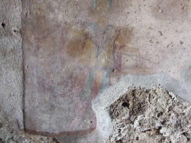 I.11.17 Pompeii. December 2007. Room 6, detail of south end of lararium painting in kitchen.