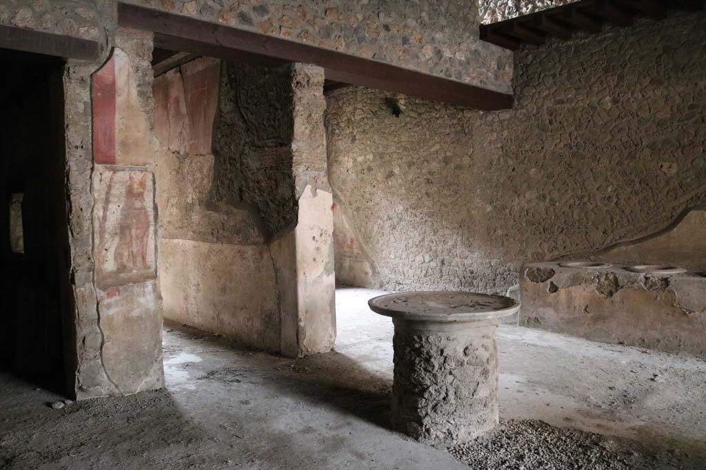 I.12.3 Pompeii. December 2018. 
Room 1, looking south-west in courtyard, towards corridor and rear room. Photo courtesy of Aude Durand.
