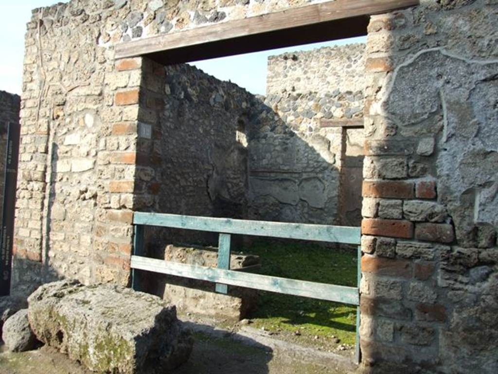 I.12.12 Pompeii. December 2018. 
West wall of shop with two niches, and small wall feature in north-west corner. Photo courtesy of Aude Durand.
