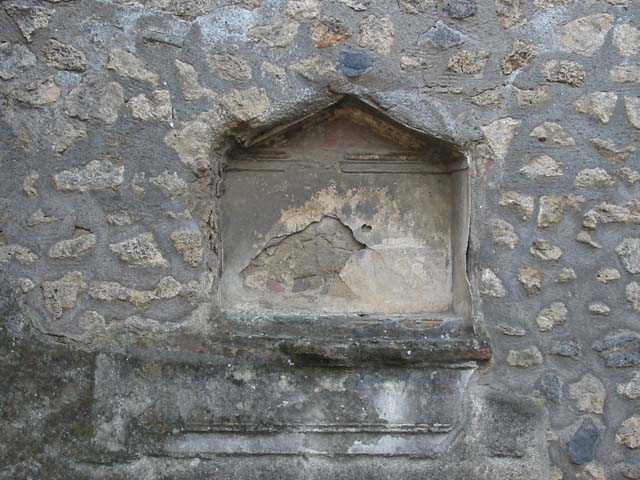 I.12.12 Pompeii. December 2018. 
Detail of window or second niche in north-west corner of west wall. Photo courtesy of Aude Durand.
