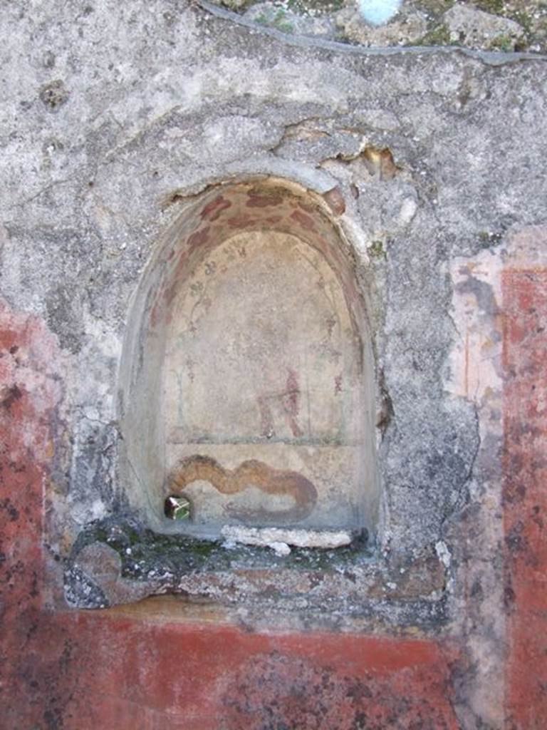 I.12.16 Pompeii. March 2009. Room 1, south wall of atrium, with painted niche.