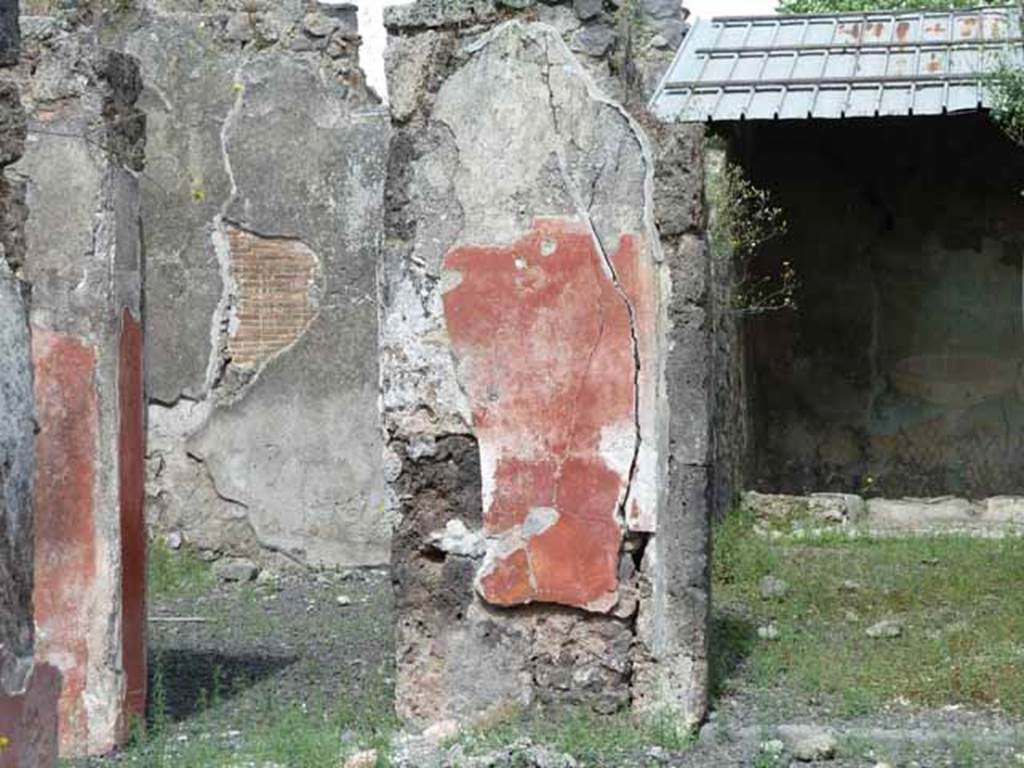 I.12.16 Pompeii. May 2010. Doorways to rooms 3 and 4 on east side of atrium.