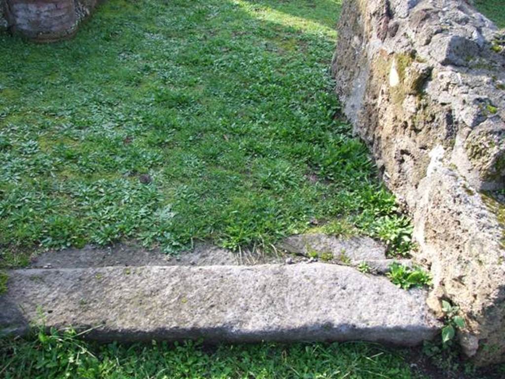 I.14.4 Pompeii.  House.  December 2007.  Stone sill in corridor 11 next to room 7.