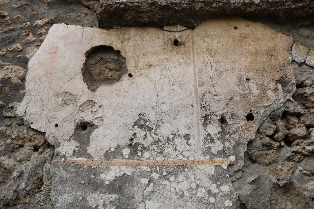 I.14.5 Pompeii. December 2018. Looking towards wall with detail of remaining painted decoration. Photo courtesy of Aude Durand.