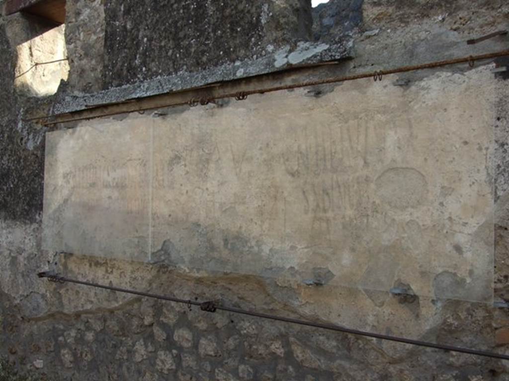 I.14.7/8 Pompeii. December 2005. Graffiti between I.14.7 and I.14.8.