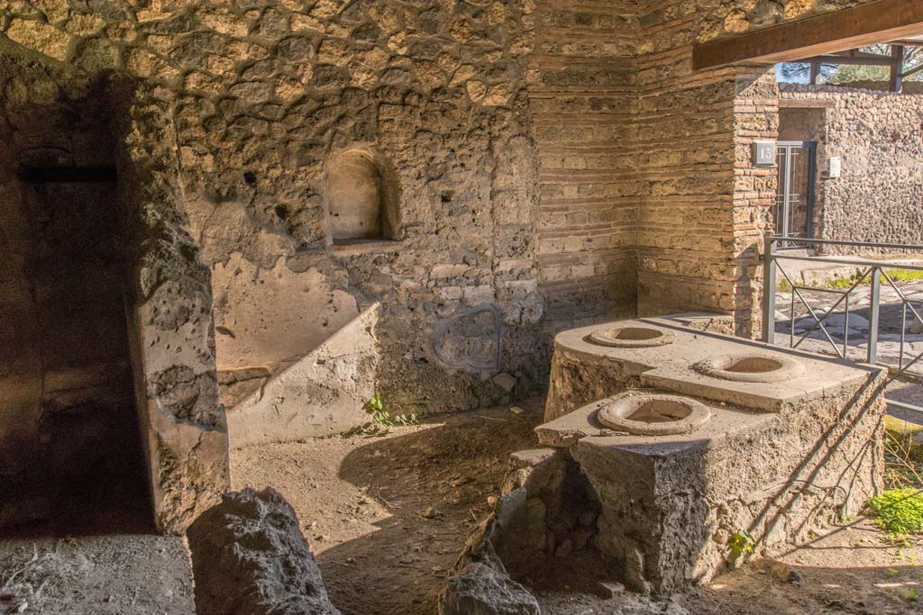 I.14.15 Pompeii. January 2019. Looking towards rear room, on left, and east side of bar-room, centre and right.
Photo courtesy of Johannes Eber.
