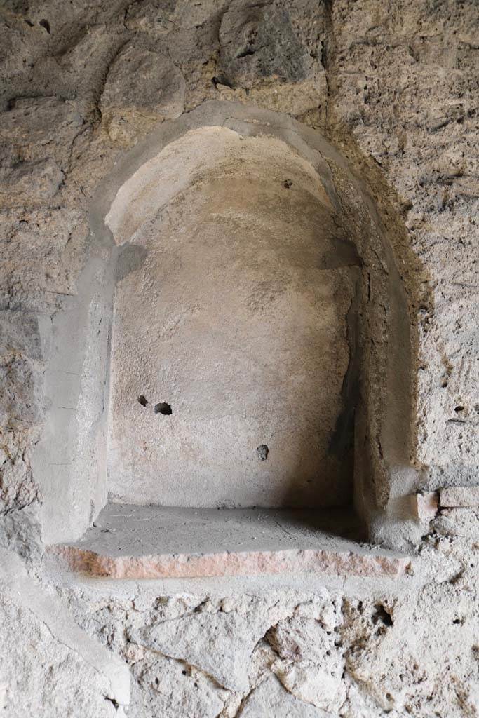 I.14.15 Pompeii. December 2018. 
Detail of niche in east wall of bar area. Photo courtesy of Aude Durand.
