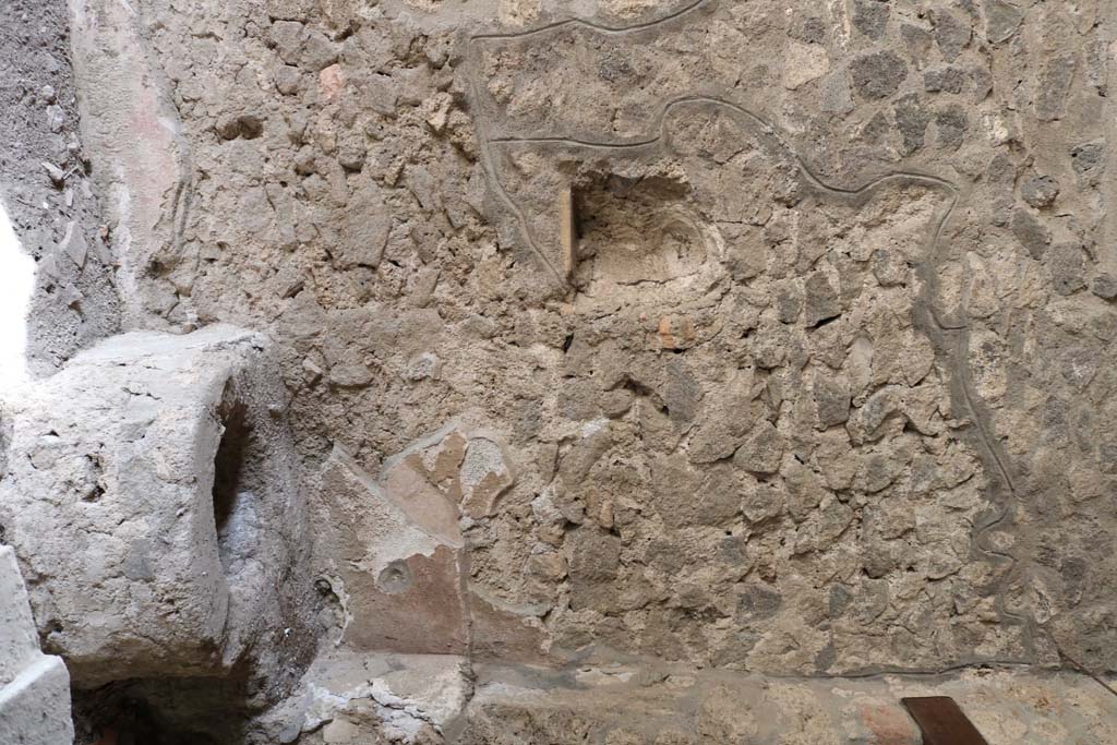 I.14.15 Pompeii. December 2018. 
Detail of small niche set into west wall. Photo courtesy of Aude Durand.
