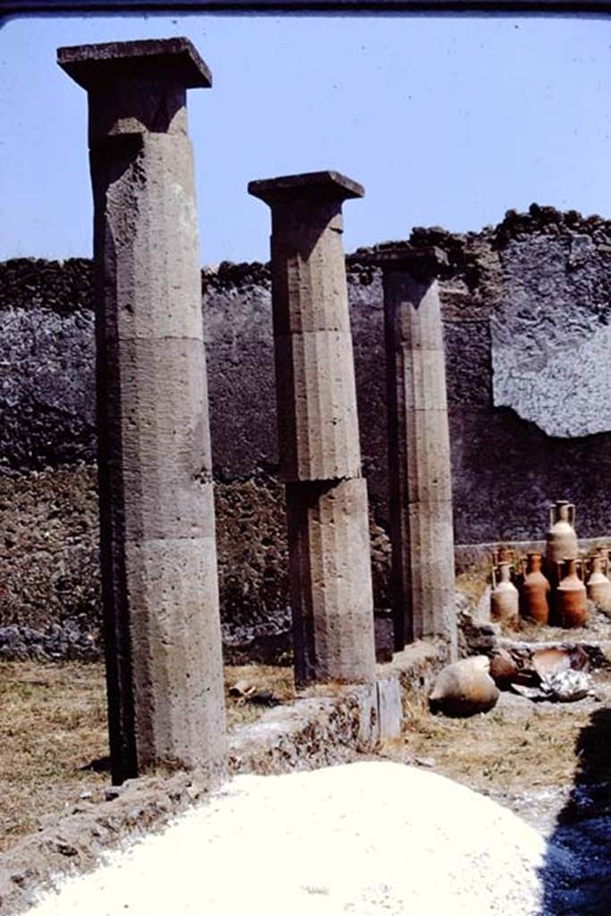 I.15.3 Pompeii. 1972. Columns of south peristyle 13. Photo by Stanley A. Jashemski. 
Source: The Wilhelmina and Stanley A. Jashemski archive in the University of Maryland Library, Special Collections (See collection page) and made available under the Creative Commons Attribution-Non Commercial License v.4. See Licence and use details. J72f0657
