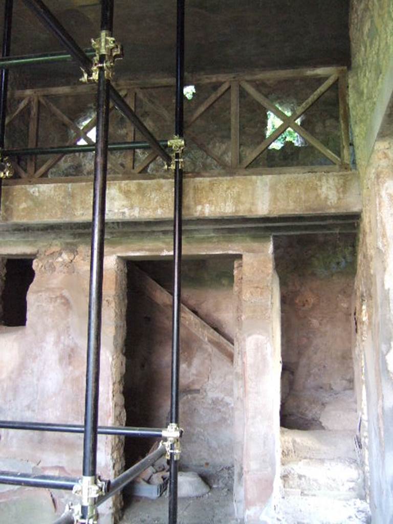 I.17.4 Pompeii.  May 2006. Open area or yard on south side of peristyle garden.  Stairs, cupboard and upper gallery.
