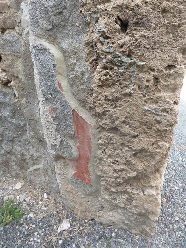 I.21.2 Pompeii. September 2015. Remains of painted plaster on east wall near doorway to atrium.