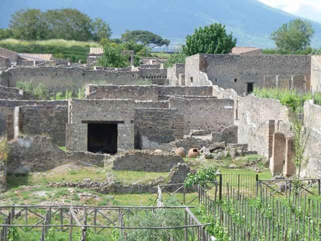 I.22.2 and I.22.3 Pompeii. May 2010. Rear of house, and I.22.3 on the north-east corner.
