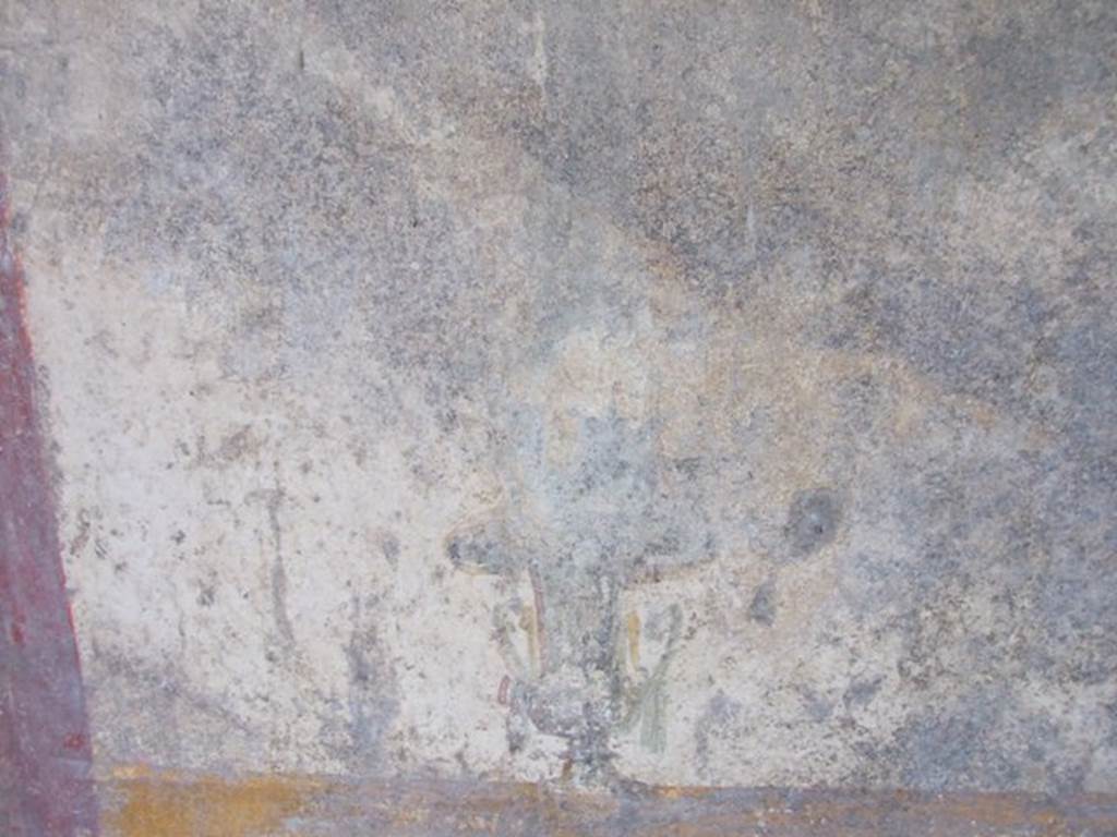 II.1.5 Pompeii.  Large Taberna.  West wall of rear room.  Detail of wall painting of an urn.