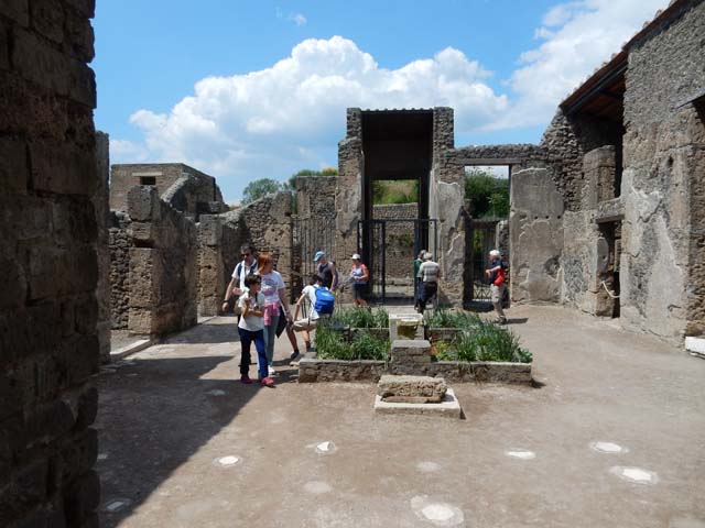 II.2.2 Pompeii. July 2011. 
Room 2, looking south-west across atrium towards doorway to room “b”.
Photo courtesy of Rick Bauer.

