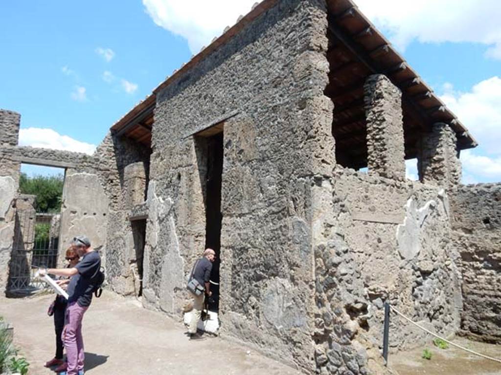 II.2.2 Pompeii. May 2016. Looking north along east side of atrium 2 with room 5, on right. 
Photo courtesy of Buzz Ferebee.
