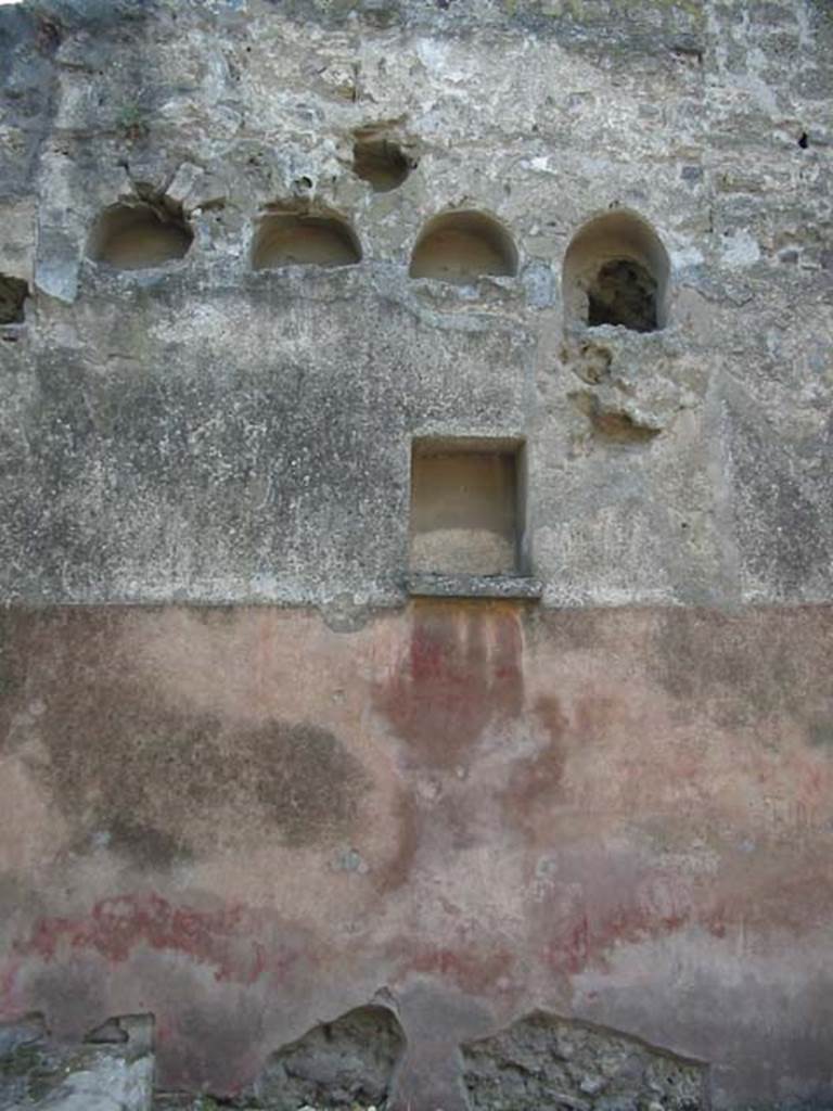 II.2.3 Pompeii. May 2003. West wall with remains of coloured zoccolo (dado) and niches. Photo courtesy of Nicolas Monteix.
