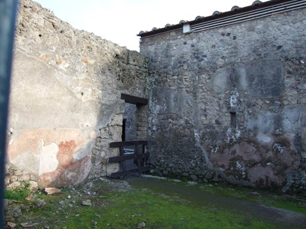 II.3.2.  East and south walls with doorway to atrium of II.3.3.
