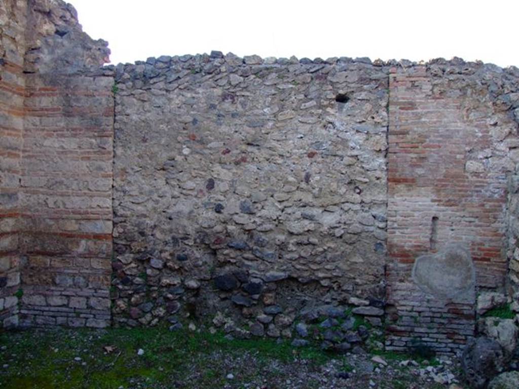 II.3.2 Pompeii. March 2009.  North wall of Yard on west of workshop.