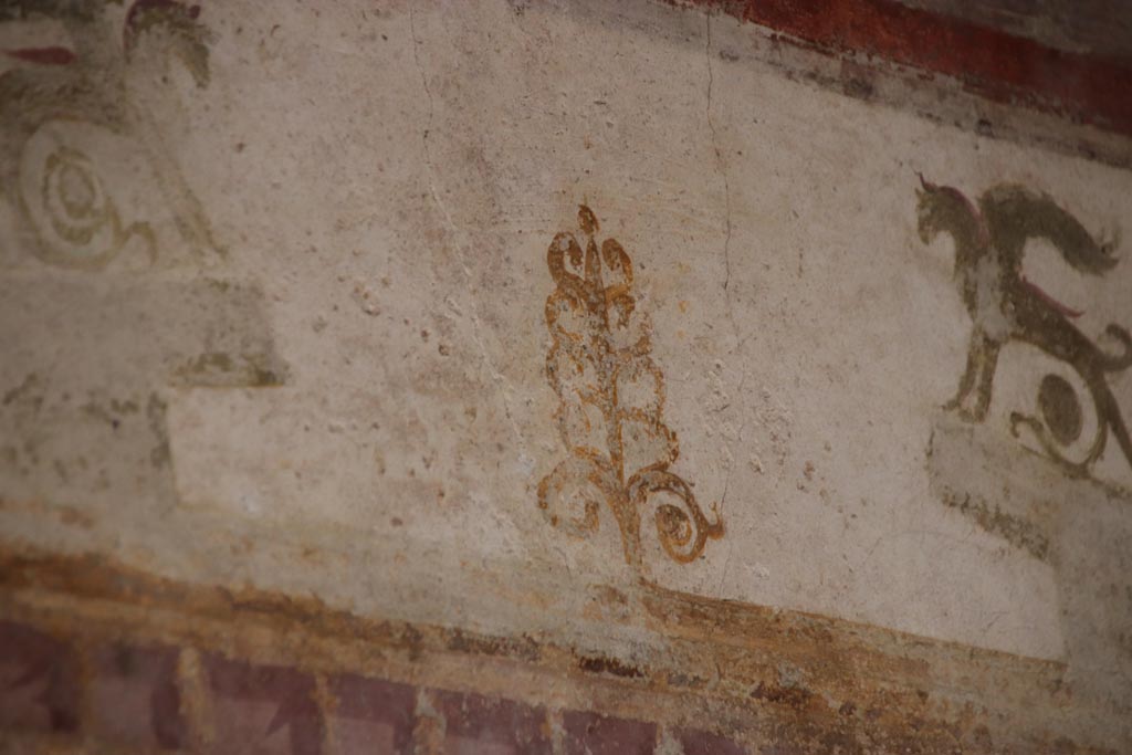 II.3.3 Pompeii. October 2022. Room 10, detail from centre of upper east wall. Photo courtesy of Klaus Heese