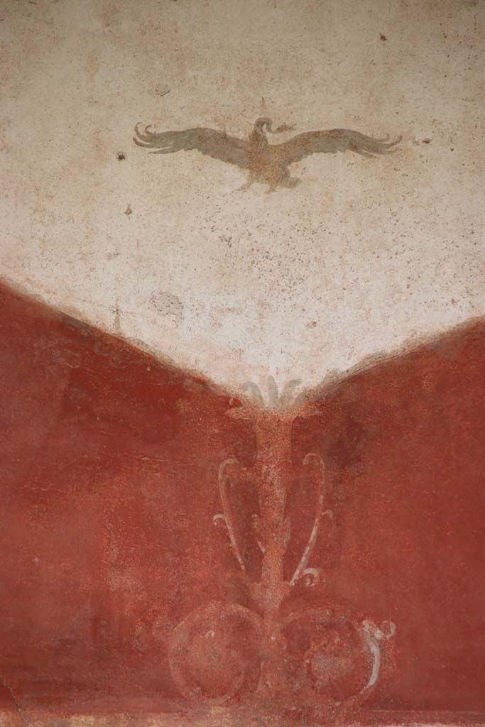 II.3.3 Pompeii. September 2017. 
Room 11, west portico, detail of painted decoration above doorway to room 13, cubiculum.
Photo courtesy of Klaus Heese.
