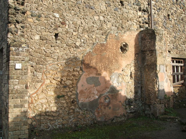 II.4.1 Pompeii. December 2006. West wall  of shop, with recess.