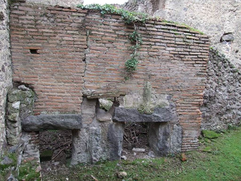 II.4.4 Pompeii. December 2006. Phallus on wall of praefurnium or furnace.