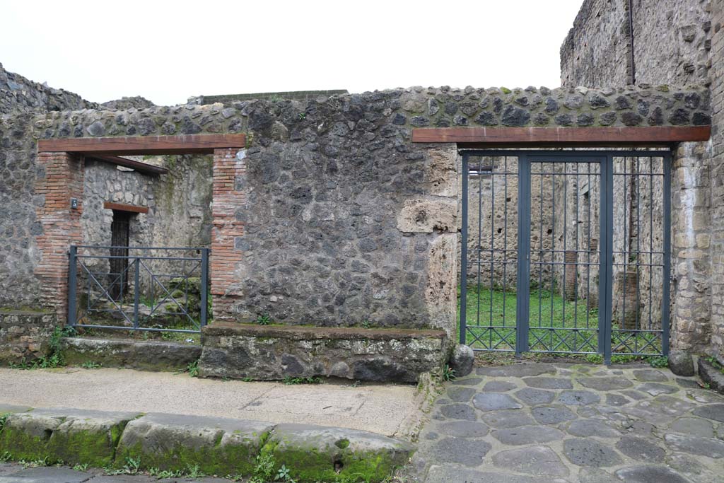 II.4.5 Pompeii, on left. December 2018. Looking south to entrance doorway, with II.4.4 on right. Photo courtesy of Aude Durand.