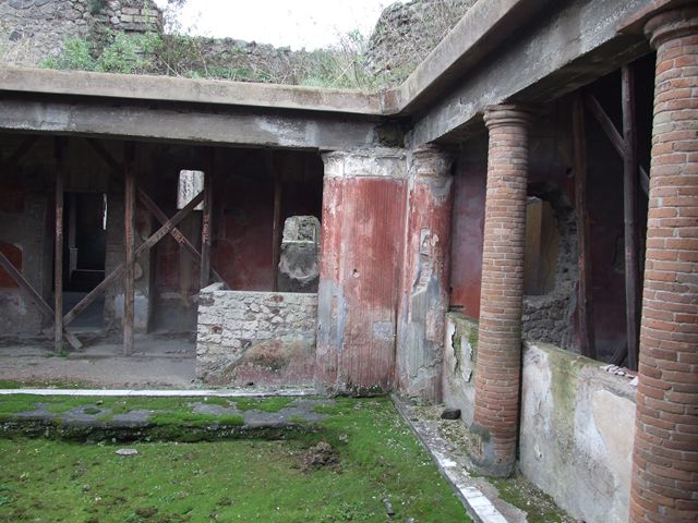 II.4.6 Pompeii.  December 2006. South west corner of Baths portico