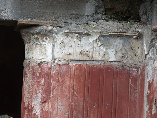 II.4.6 Pompeii.  December 2006. Detail of plaster in South west corner of Baths portico