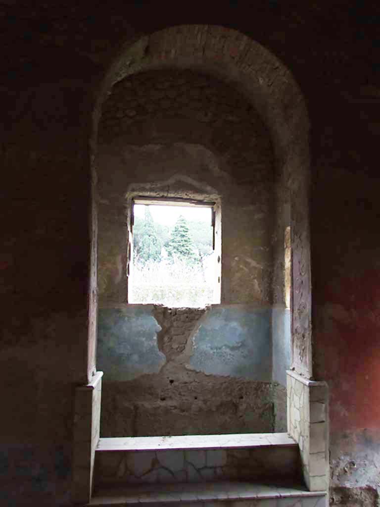 II.4.6 Pompeii. December 2006. 
Frigidarium/apodyterium, looking south towards the basin/pool with three windows.
