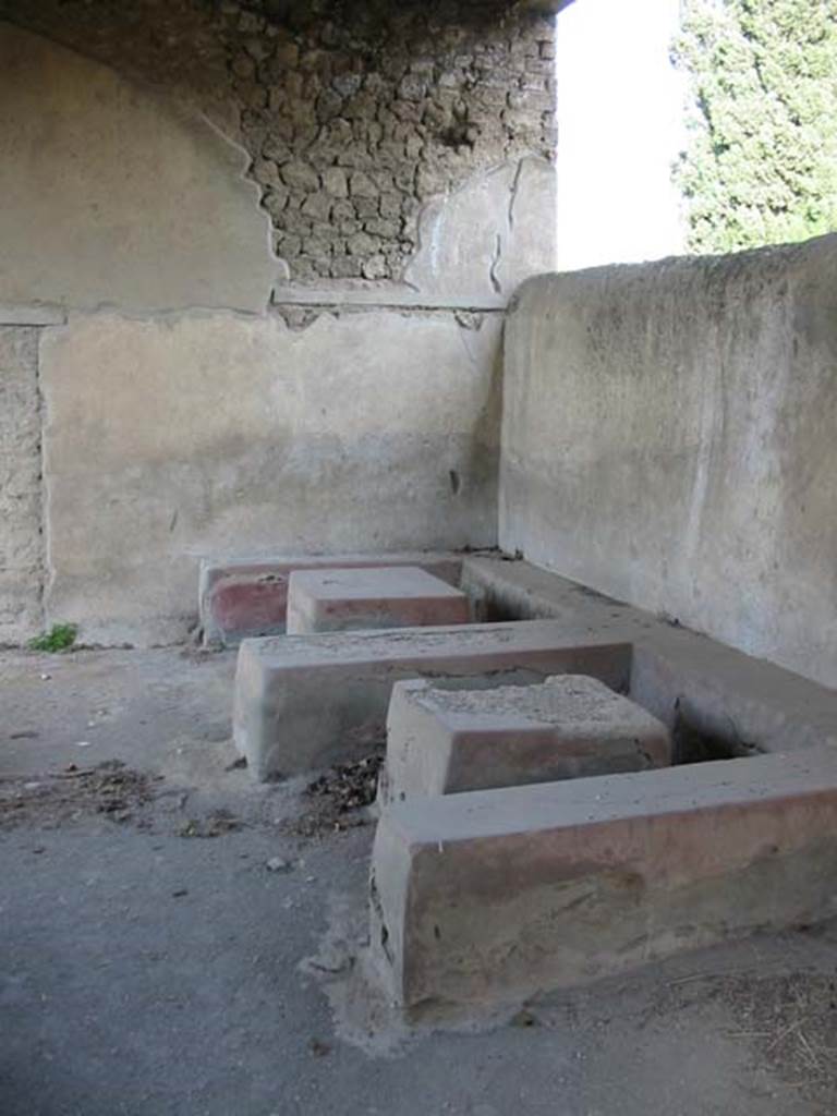 II.4.7 Pompeii. May 2003. Stone seats and tables in compartments. Photo courtesy of Nicolas Monteix.

