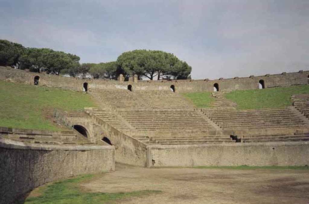 II.6 Pompeii. 1944. Arena and seating of Amphitheatre, north-east corner. Photo courtesy of Rick Bauer.