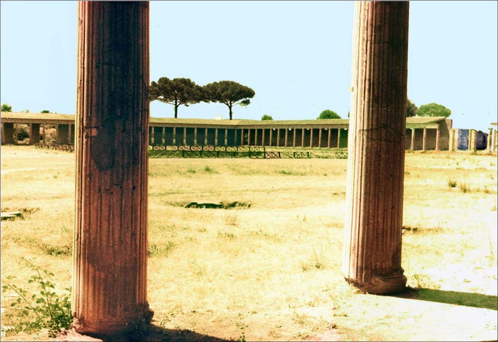 II.7.5 Pompeii. June 1962. Looking south-west from north portico.
Photo by Brian Philp: Pictorial Colour Slides, forwarded by Peter Woods
(P43.8 POMPEII The Great Palaestra)

