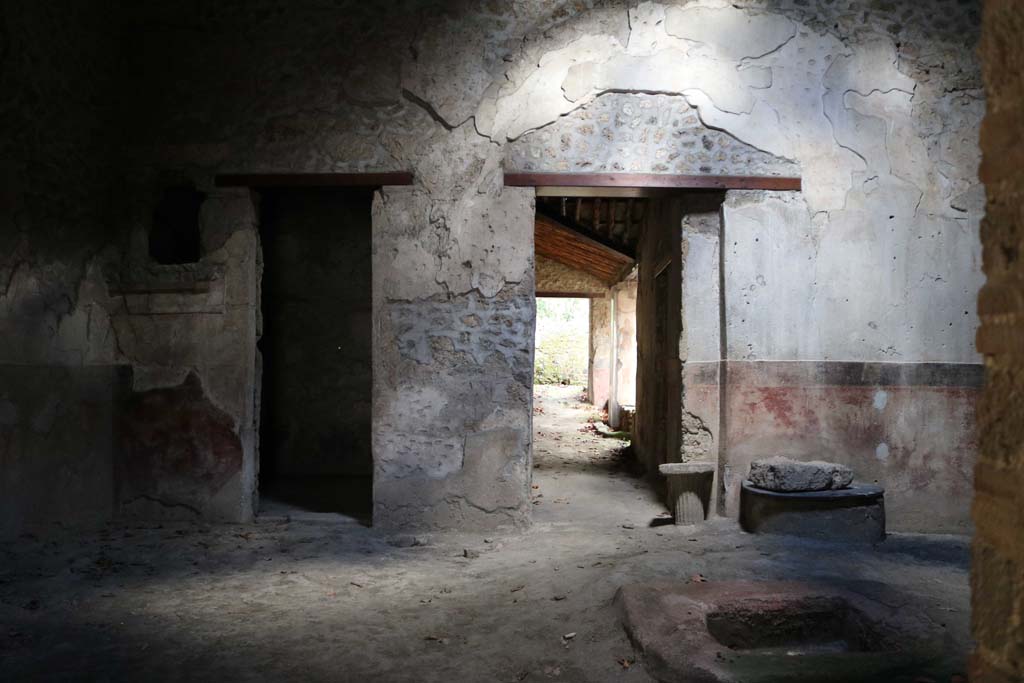 II.9.1 Pompeii. December 2018. Looking across atrium towards east wall with room 7 left and corridor 6 right. Photo courtesy of Aude Durand.
