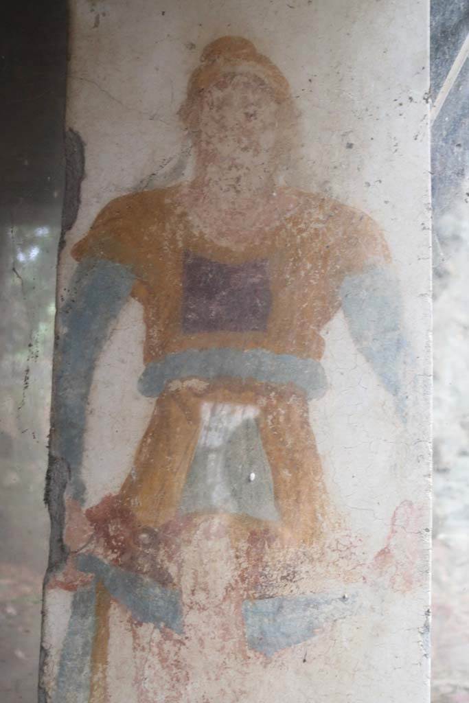 II.9.1 Pompeii. December 2018. Detail of Priapus on west face of column. Photo courtesy of Aude Durand.