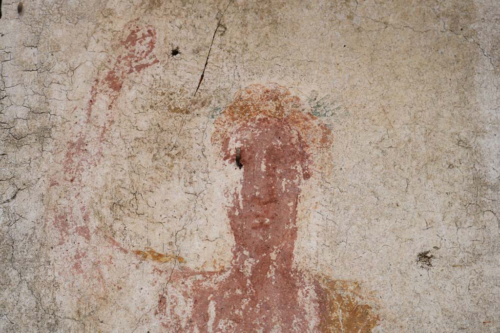 II.9.1 Pompeii.  December 2018.  
Detail of painting of face of Bacchus on south face of column on the north side of the triclinium.
Photo courtesy of Aude Durand.
