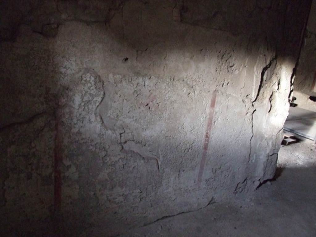 II.9.3, Pompeii. May 2018. Room 10, north-east corner and break in wall linking to atrium 2, of II.9.4
Photo courtesy of Buzz Ferebee. 
