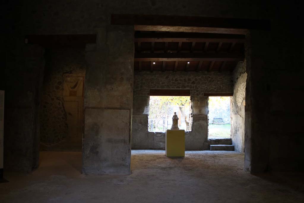 II.9.4 Pompeii. December 2018. 
Looking east across room 2 atrium, towards doorway to room 4 in north-east corner of atrium, on left. Room 5 is on the right.
Photo courtesy of Aude Durand.

