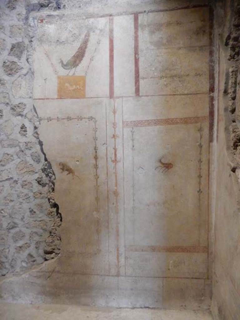II.9.4, Pompeii. May 2018. Room 4, painted peacock from east wall. Photo courtesy of Buzz Ferebee. 

