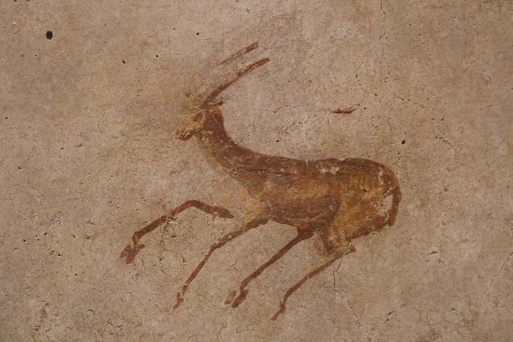 II.9.4 Pompeii. May 2018. Room 4, detail of deer from centre of panel on east wall. Photo courtesy of Buzz Ferebee. 
