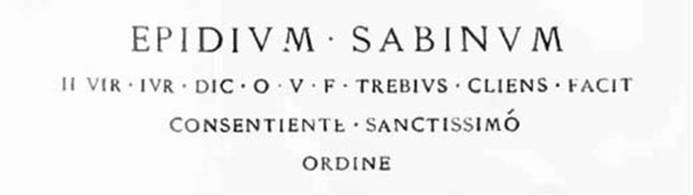 Epidium Sabinum / IIvir(um) iur(e) dic(undo) o(ro) v(os) f(aciatis) Trebius cliens facit / consentiente sanctissimo / ordine       [CIL IV 7605]