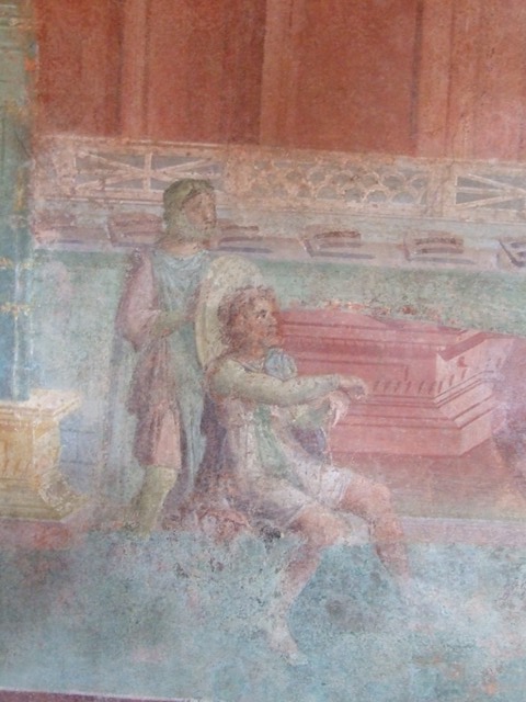 III.4.b. Pompeii.  March 2009. Room 3.  Oecus.  North wall.   Detail of remains of wall painting of Iphigenia and her attendants.